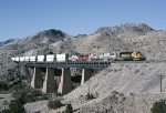 ATSF 5075 is e/b on bridge 1 in Abo Canyon.